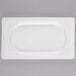 A white rectangular Libbey porcelain tray with a white border.