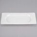 A white rectangular Libbey porcelain tray with a white border.