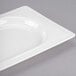 A white rectangular porcelain tray with a square edge.