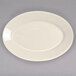 A white Homer Laughlin oval china platter with a rolled edge.