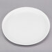 A Libbey white porcelain platter with a rim.