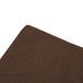 a brown paper towel on a white background