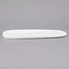 A white porcelain Libbey tray with an oval shape and long handle.