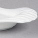 A white porcelain tray with curved edges.