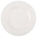 A white porcelain plate with a medium rim design.