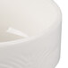 A close up of a white Reserve by Libbey Royal Rideau porcelain bouillon bowl with a white rim.