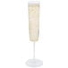 A clear plastic champagne flute filled with champagne and bubbles.