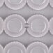A close-up of a Chocolate World polycarbonate cup chocolate mold with 24 circles.