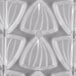 A clear plastic container with triangular shapes.