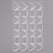 A clear plastic tray with triangular shapes.