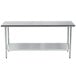 An Advance Tabco stainless steel work table with a galvanized undershelf.