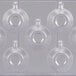 A clear plastic Martellato chocolate mold with 7 espresso cup compartments.