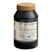 A plastic container of Golden Barrel Blackstrap Molasses with a label.
