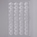 A clear plastic Matfer Bourgeat chocolate mold with various shapes and designs.