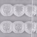 A white Matfer Bourgeat plastic chocolate mold tray with 36 compartments.