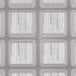 A white square tile with small square compartments.