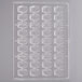 A clear plastic Matfer Bourgeat chocolate mold tray with rectangular holes.