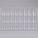 A clear plastic tray with small rectangular compartments.