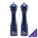 A Chef Specialties cobalt blue pepper mill and salt mill set on a counter.