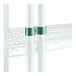 A green Regency shelf with metal post clamps.