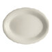 An ivory oval platter with a scalloped edge.