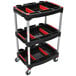 A black Luxor mechanics cart with red trays on it.