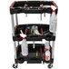 A black and red Luxor mechanics cart with tools on wheels.