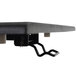 A black Luxor adjustable stand up desktop desk on a table.