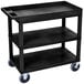 A black Luxor utility cart with three shelves and wheels.