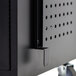 A black rectangular Luxor tablet charging station with holes on the sides.