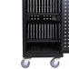 A black metal Luxor tablet charging station with shelves.