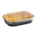 A Durable Packaging aluminum foil entree container with a black and gold plastic dome lid.