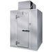 A large silver metal Kolpak walk-in freezer with a door open.