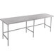 An Advance Tabco stainless steel work table with metal legs.