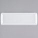 A white rectangular Fineline Tiny Temptations tray with a handle.