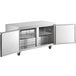 An Avantco stainless steel undercounter refrigerator with two doors open.