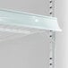 A white swing glass door merchandiser refrigerator with customizable shelving and LED lighting.