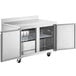 An Avantco stainless steel worktop freezer with two doors open.