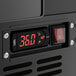 The digital display on an Avantco black horizontal bottle cooler with red numbers.