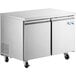 Two Avantco stainless steel undercounter refrigerators on wheels.