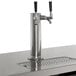 A silver metal Avantco double beer tap with black handles.