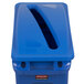 A blue Rubbermaid Slim Jim recycling container with a blue slotted lid.