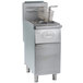 A Globe stainless steel floor gas fryer with a basket.