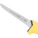 An ARY VacMaster serrated utility knife with a yellow handle.