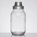 A clear glass Tablecraft Mason jar with a metal top.