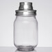 A Tablecraft glass mason jar with a metal top.
