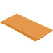 A folded Creative Converting pumpkin spice orange plastic table cover.