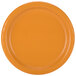 A close-up of a Creative Converting Pumpkin Spice Orange paper plate.