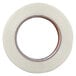 A roll of Shurtape general purpose fiberglass reinforced strapping tape with a circle in the middle