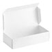 A white candy box with an open lid.